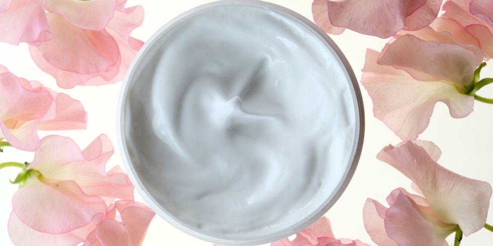 skin cream with flower petals