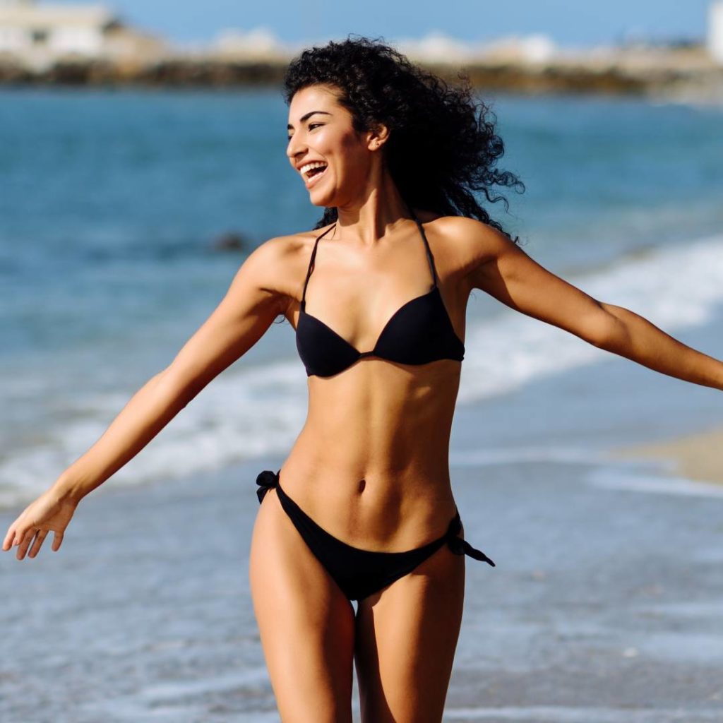 Image of female in bikini showing BodyTite Body on Beach
